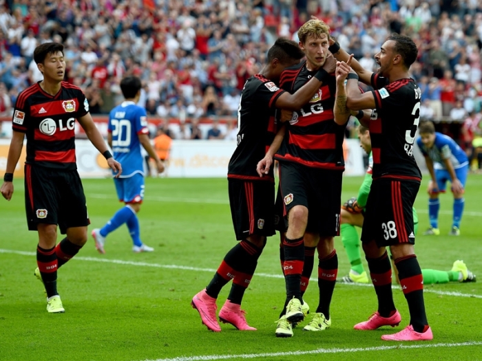 Leverkusen celebrate their first goal.